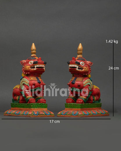 Tibetan Buddhist snow lion pair symbolizing strength courage and protection