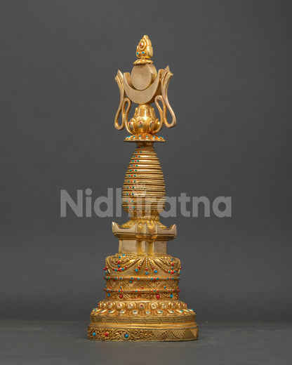 Tibetan Chorten featuring tiered spire sun crescent moon and flaming jewel