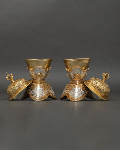 Tibetan Kapala Set showing copper ritual skull cups with engraved Buddhist symbols sacred ceremonial detailing and traditional Himalayan artistry