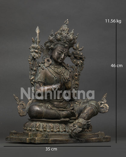 tikshna manjushri bronze statue right side view showing lotus and attributes