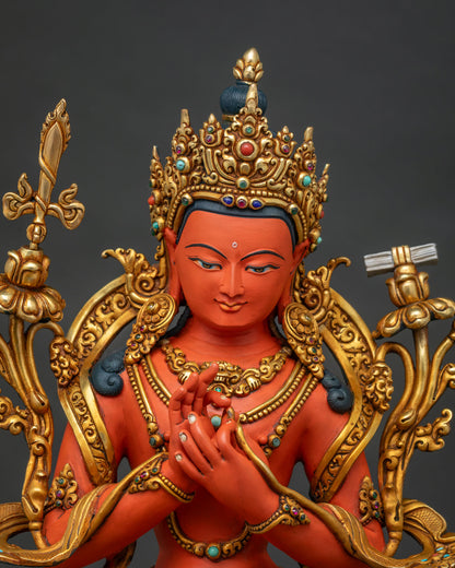Tikshna Manjushri statue close up, dharmachakra mudra hands and gold jewelry
