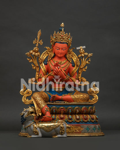 Tikshna Manjushri statue seated in lalitasana with gold crown on lotus throne with snow lion