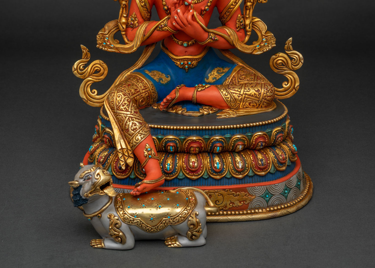 Tikshna Manjushri statue side view with snow lion, Tibetan Buddhist art