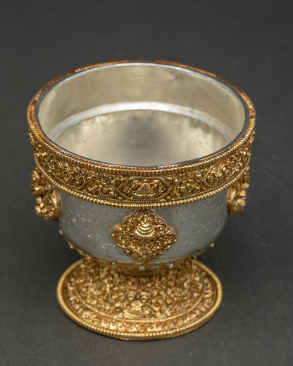 Top view water offering bowl set displaying symmetrical arrangement of seven ritual vessels with gold and silver plated finish