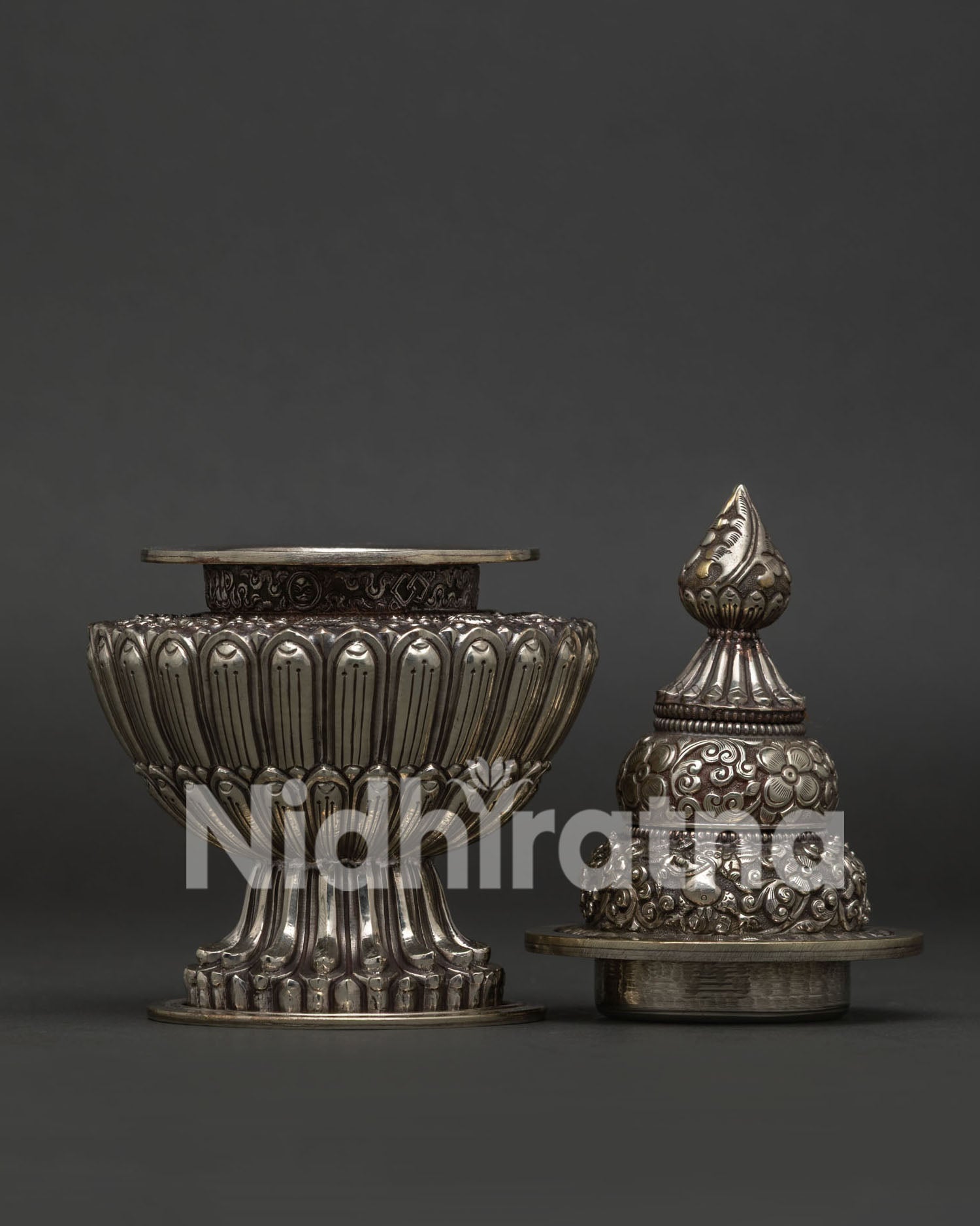 Traditional Buddhist offering vessel with silver finish for sacred rituals