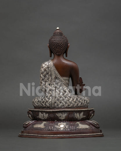 Traditional medicine buddha statue from nepal with chemically oxidized copper finish.