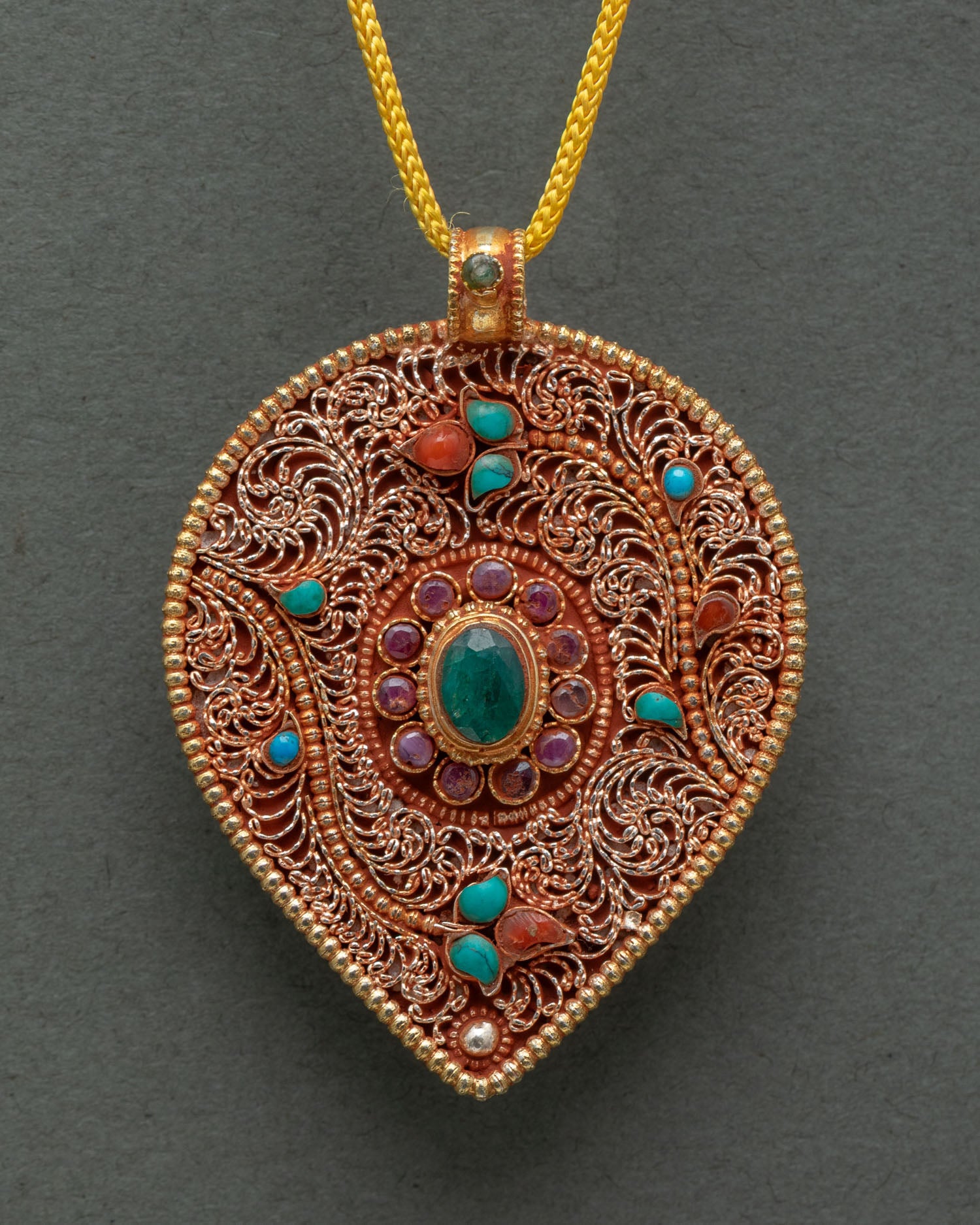 Traditional Newari artisan Leaf Locket showcasing detailed Nepalese metal craftsmanship