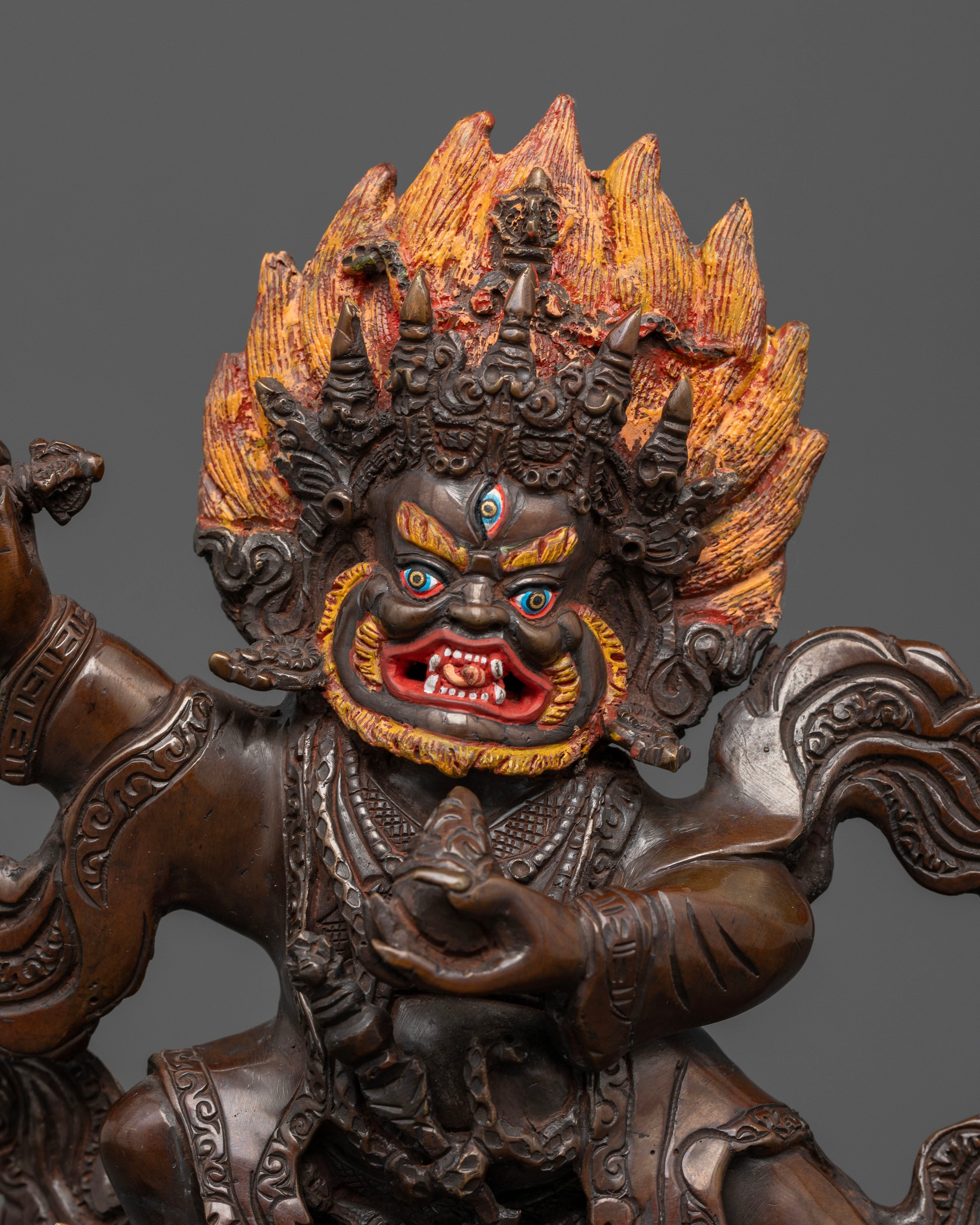 Traditional Newari Mahakala Bernagchen sculpture with wrathful expression and acrylic details