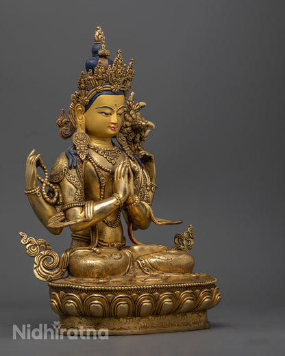 traditional fire-gilding on golden copper Chenrezig statue made using ancient lost wax technique