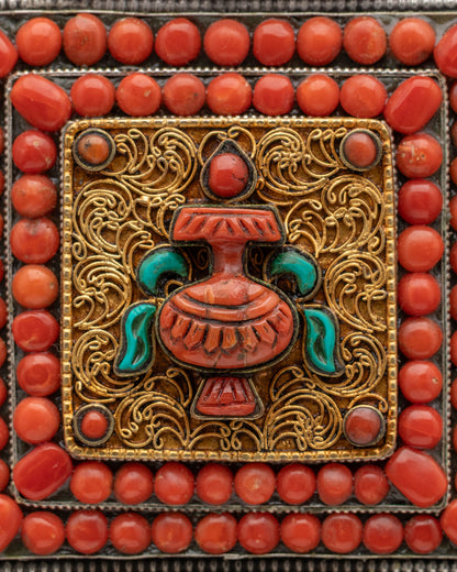 Treasure Vase Ghau Mala adorned with turquoise coral stones and intricate gold filigree