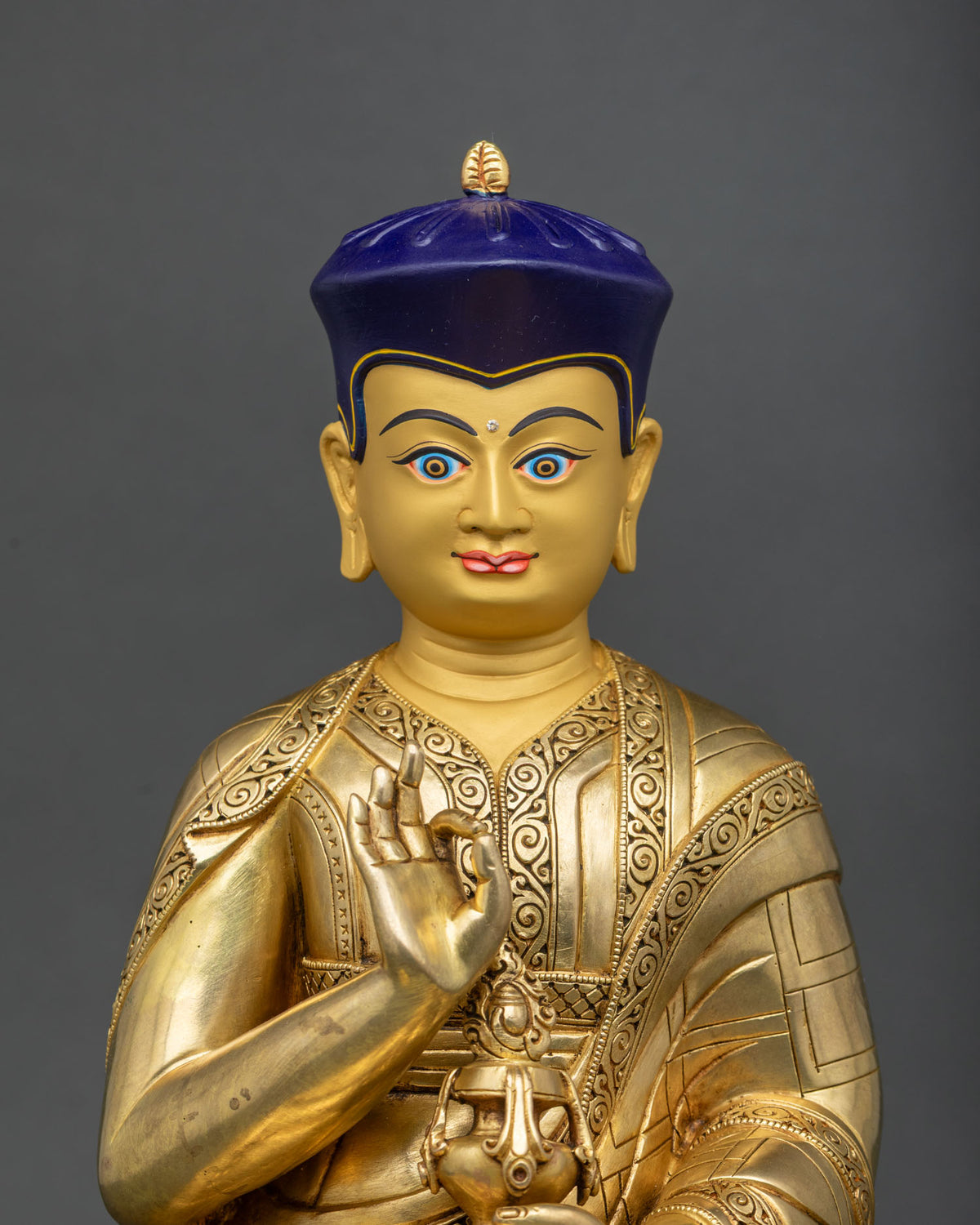 Tsangpa Gyare Statue close-up, gold-gilded copper Drukpa Kagyu founder detail