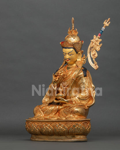Tsokye Dorje statue opposite side view with hand-chased robes and lotus base