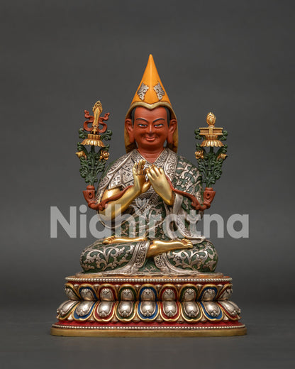 Tsongkhapa Statue close-up showing silver robes, gold-gilded mudra hands and jewel-toned lotus throne base