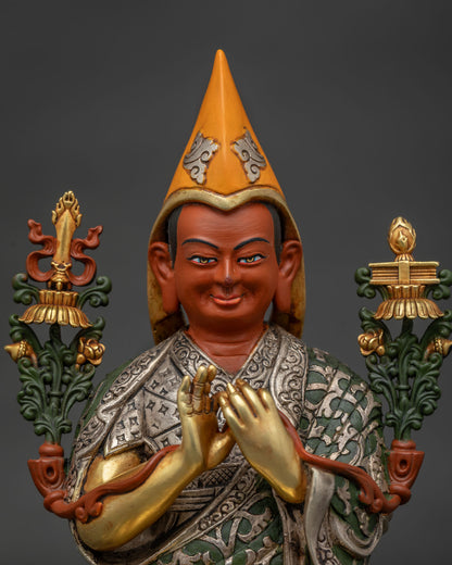 Tsongkhapa statue face close-up with yellow Pandita hat, serene expression and gold-gilded features Nepal