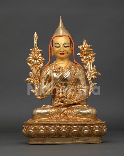 front view of tsongkhapa statue seated in vajra posture with gold gilded copper finish and yellow pandit hat