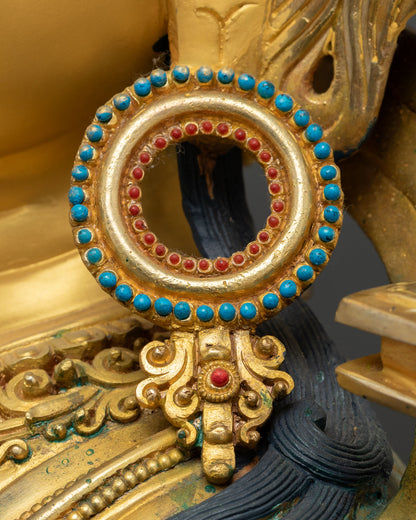 Turquoise and coral earring detail, Manjushri Bodhisattva statue Nepal