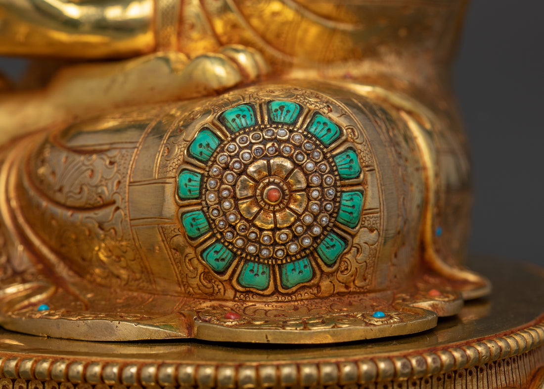 turquoise gemstones in knee of buddha statue