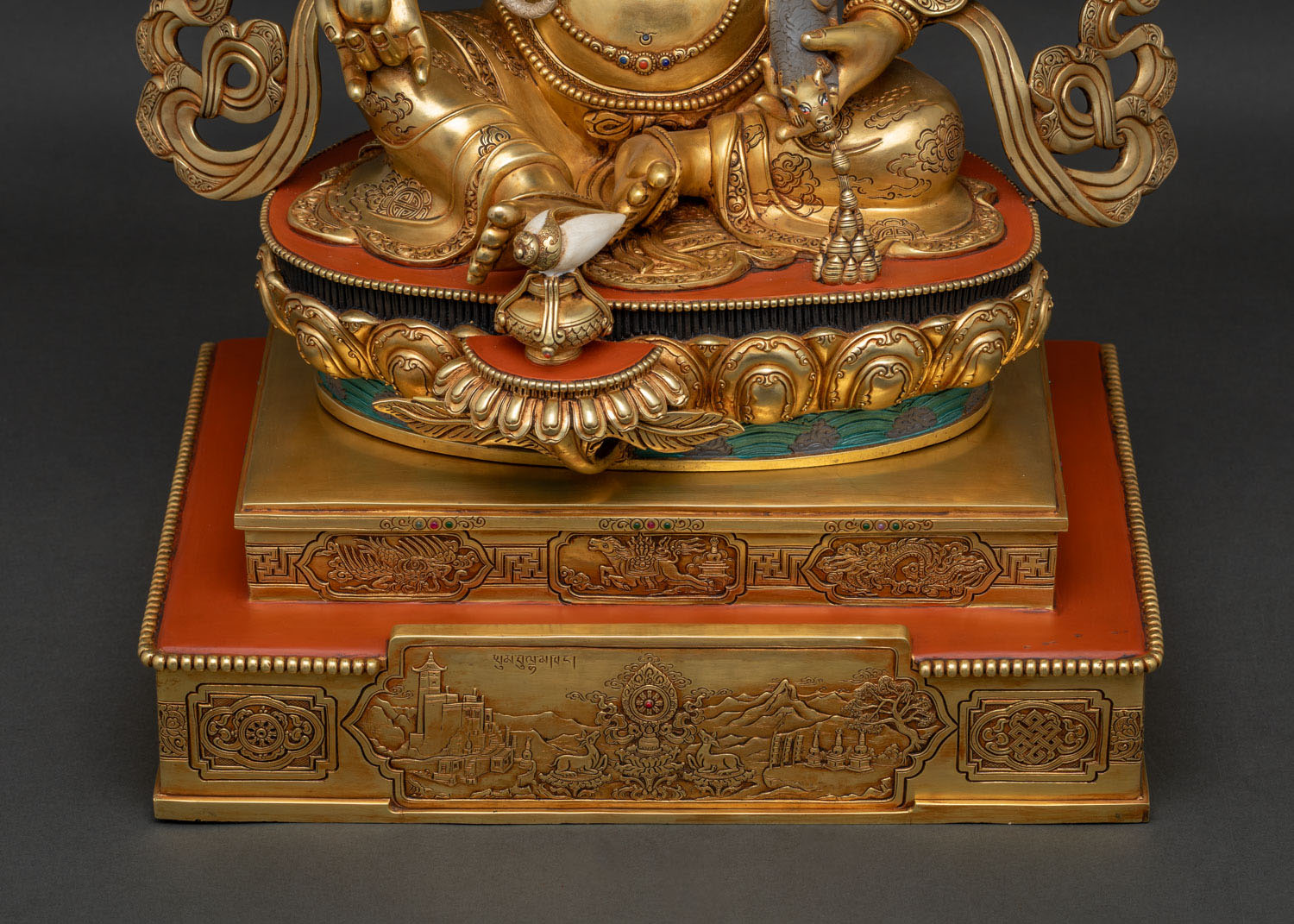Underside view of Dzambhala Statue's copper alloy throne base