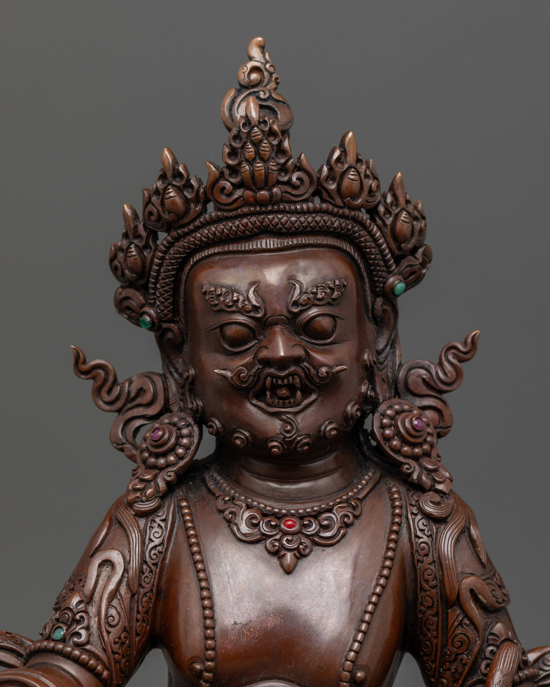 Oxidized Dzambhala Statue: Radiating Fortune and Prosperity