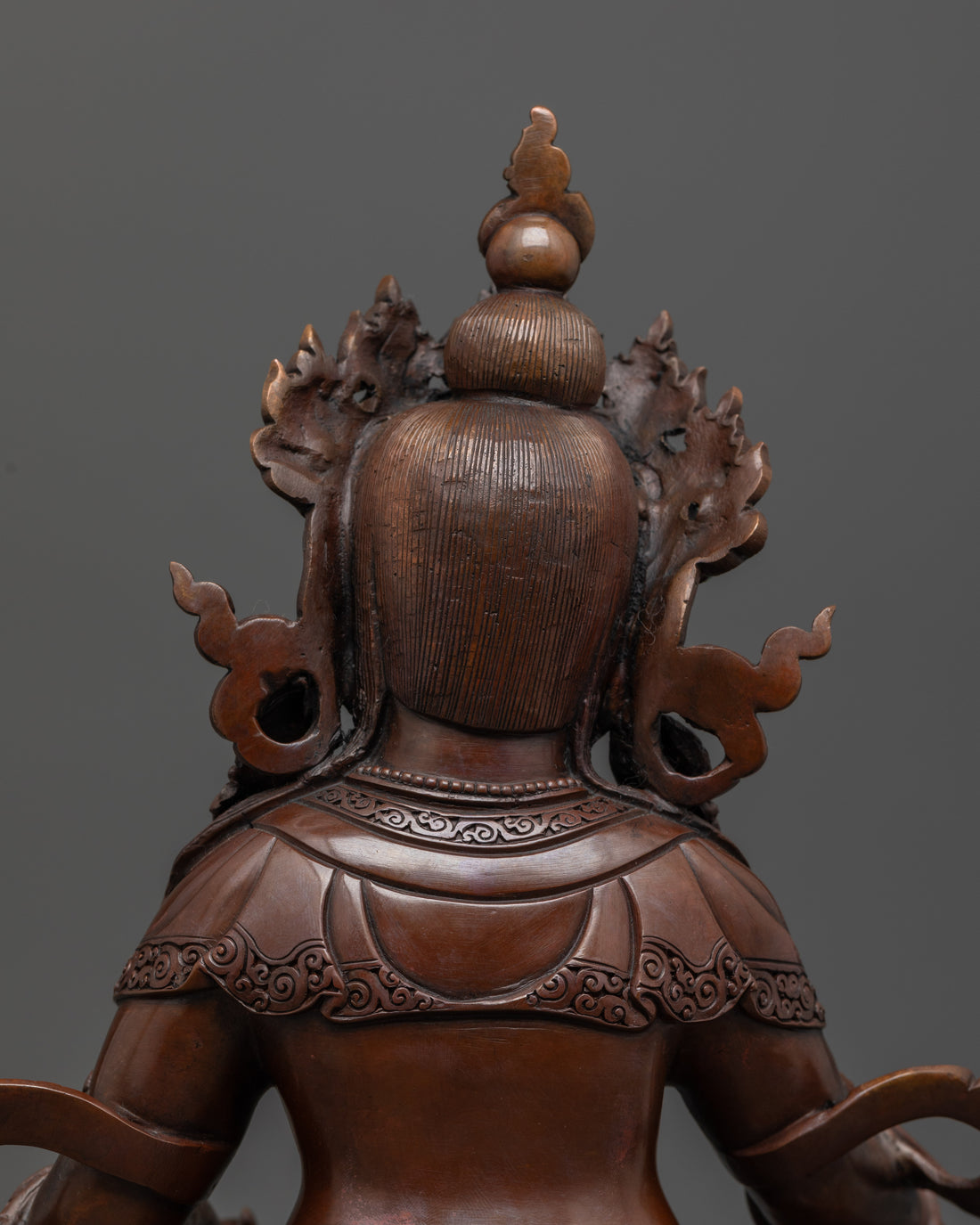 Oxidized Dzambhala Statue: Radiating Fortune and Prosperity