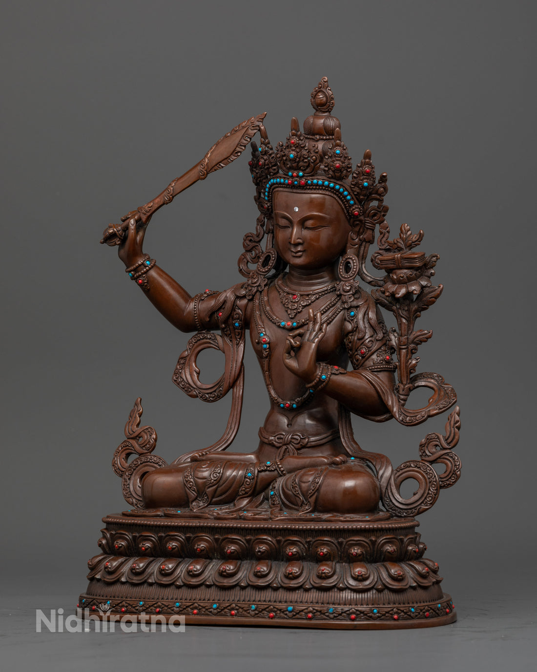 Elegant Oxidized Manjushri Statue: A piece of Buddhist Art