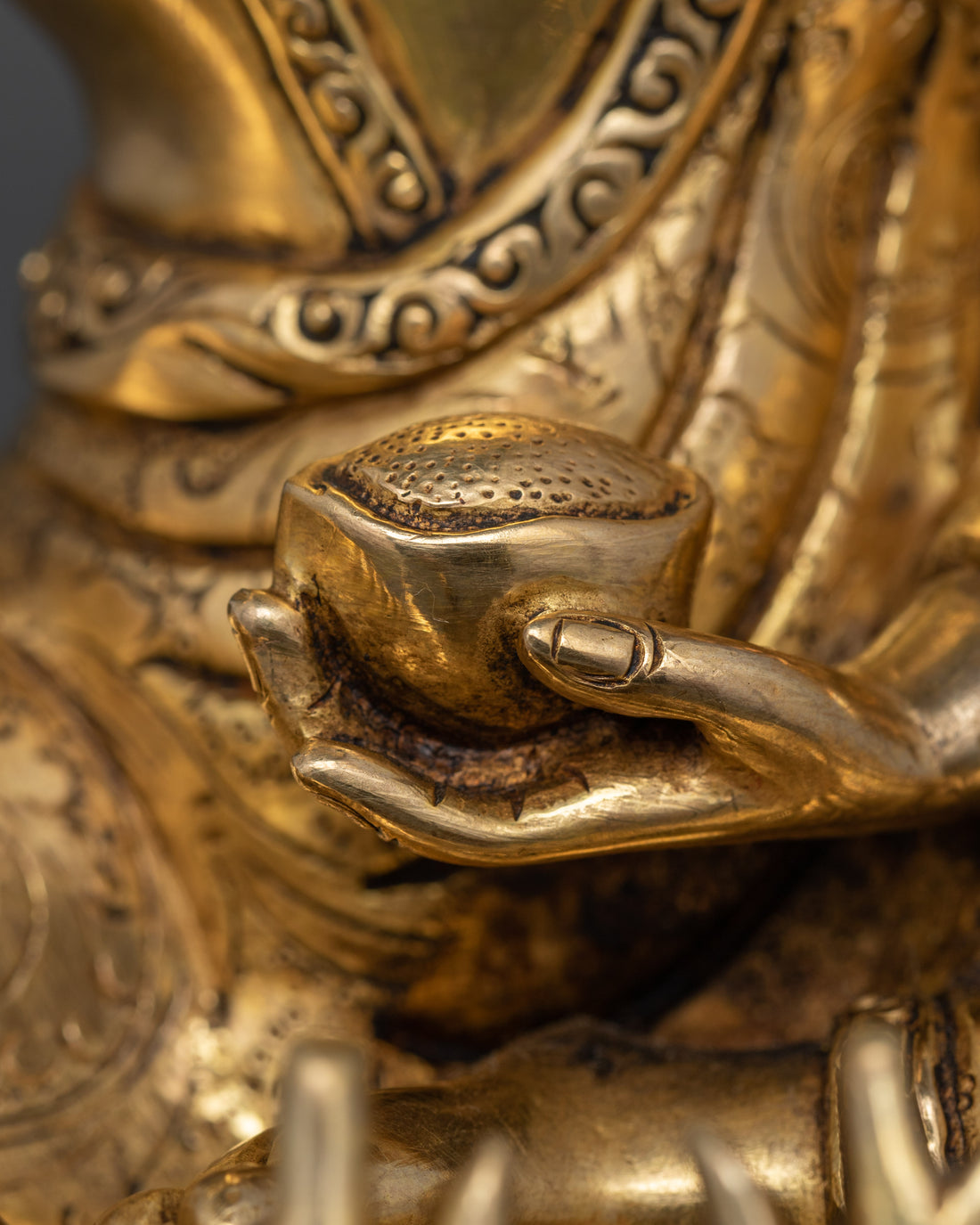 Divine Contemplation: The Golden Milarepa Statue