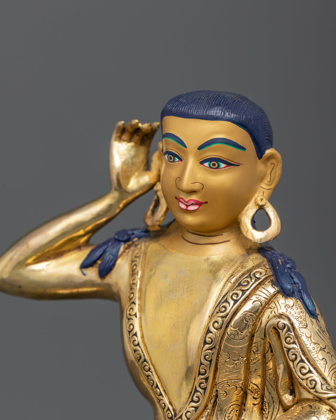 Divine Contemplation: The Golden Milarepa Statue