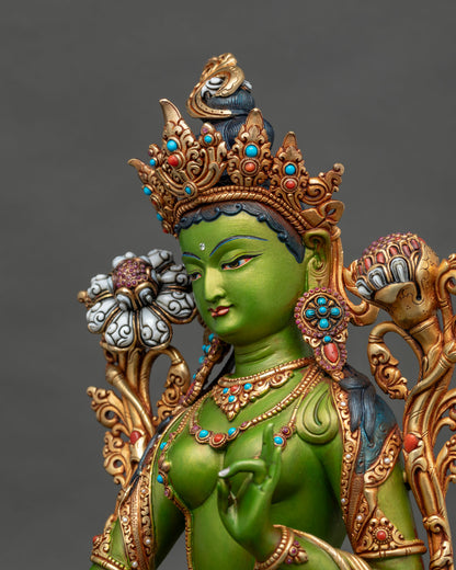 Upper body of Green Tara statue with jeweled necklace, turquoise inlays and hand gesture