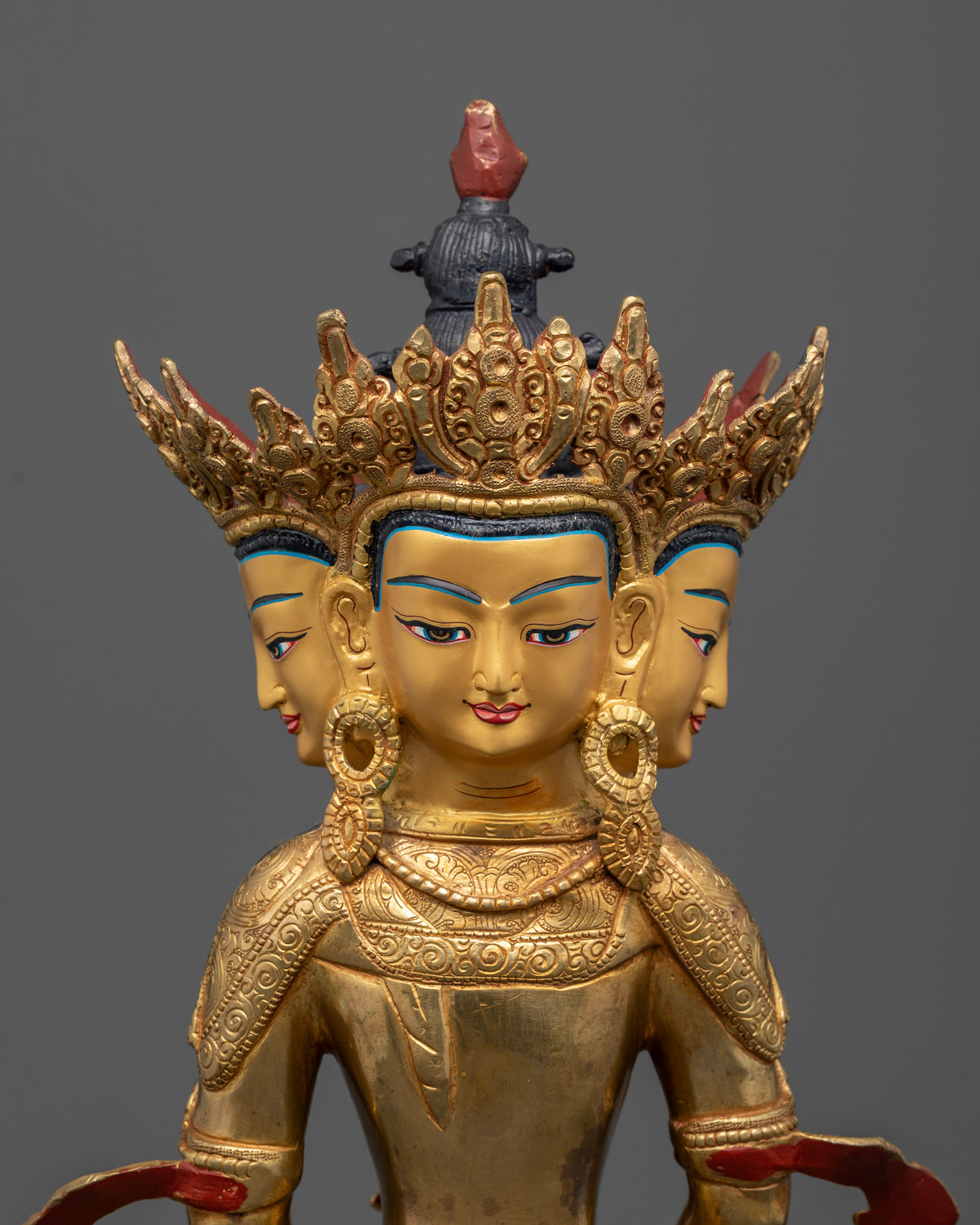 Vairocana Buddha gold-painted faces featuring intricate details and fine Nepalese metalwork