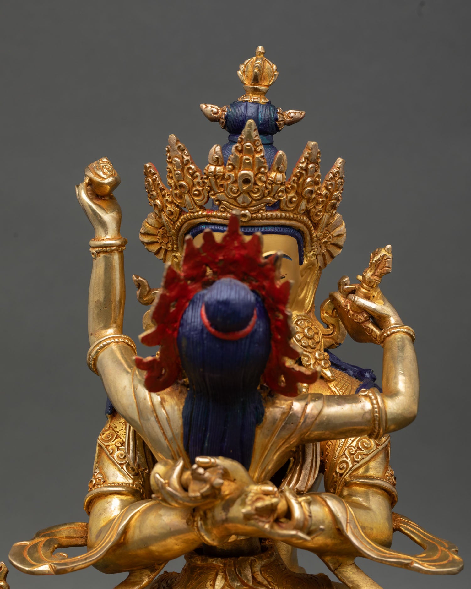 vajradhara and consort statue close up gold painted faces semi precious stones himalayan craftsmanship