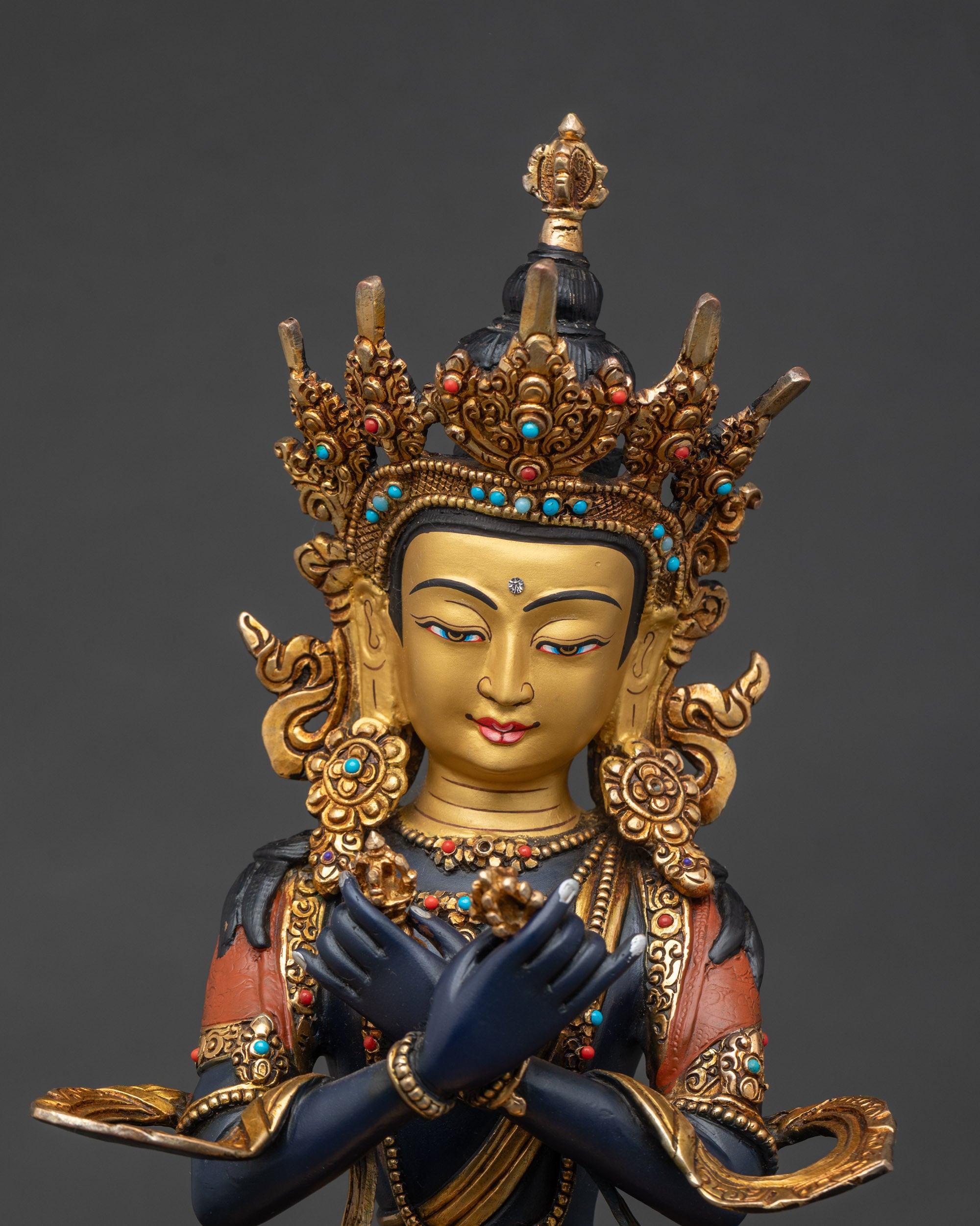 vajradhara-buddha-statue-close-up-gold-painted-face-five-jeweled-crown-tibetan-buddhist-deity