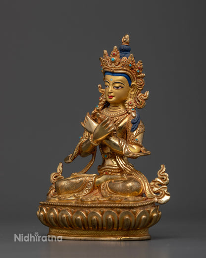 Vajradhara Meditation Statue with radiant gold fire-gilding symbolizing wisdom and compassion in Vajrayana Buddhism