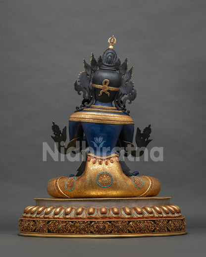 Vajradhara statue back view, gold gilded crown, lotus pedestal, Nepali art