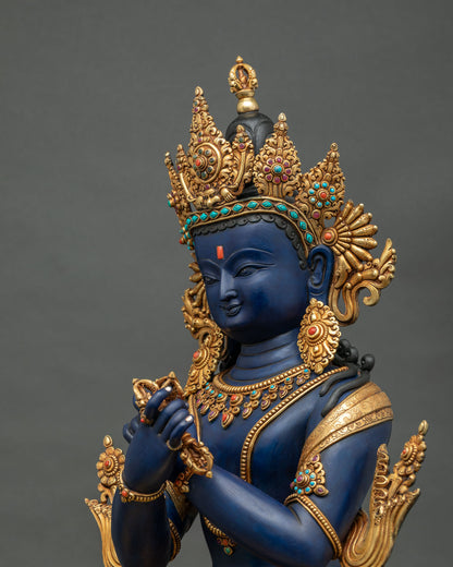 Vajradhara statue side close-up, gold gilded robe, Nepali Newari jewelry detail