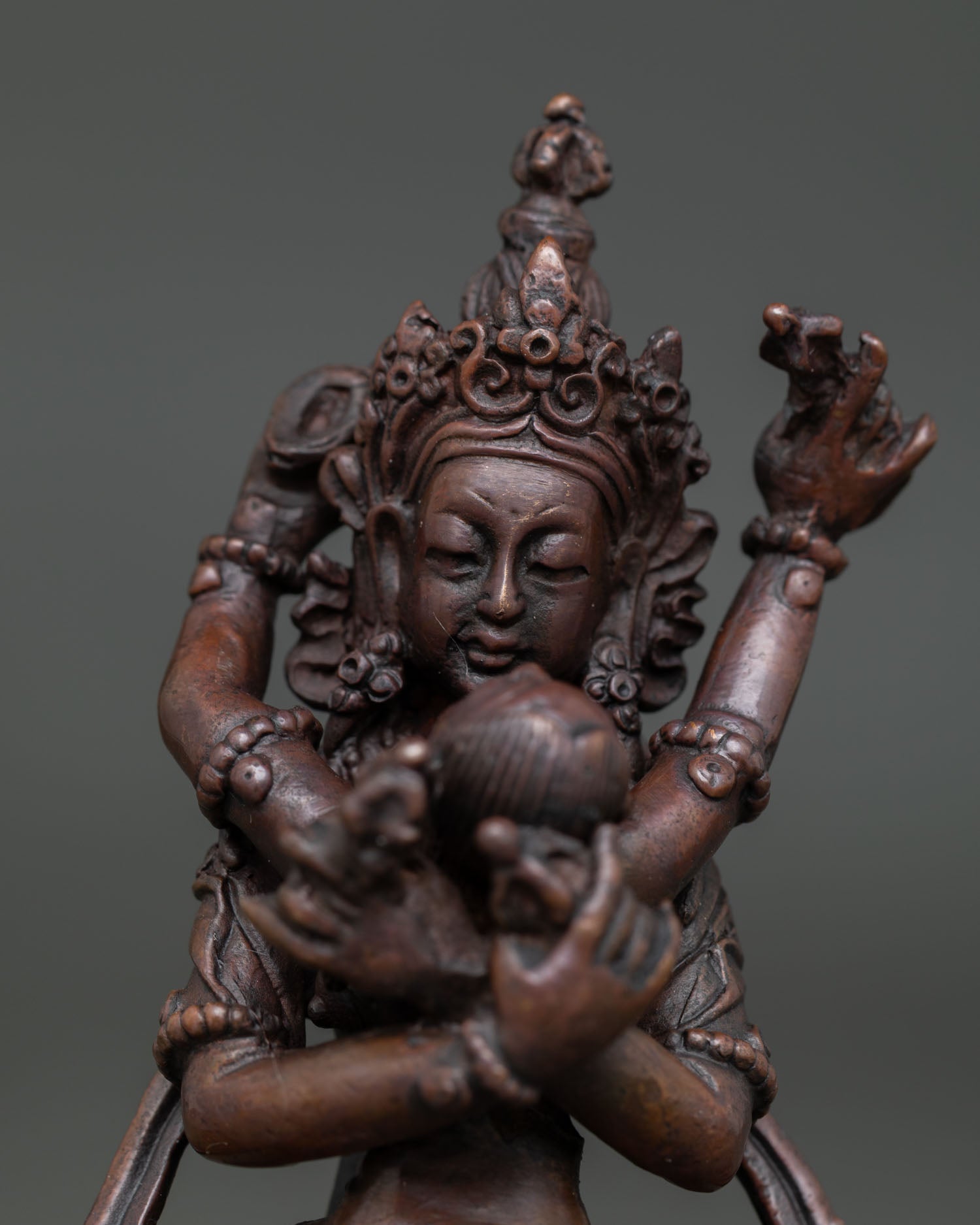 Vajradhara with consort statue regular close up in Nepalese Buddhist art.