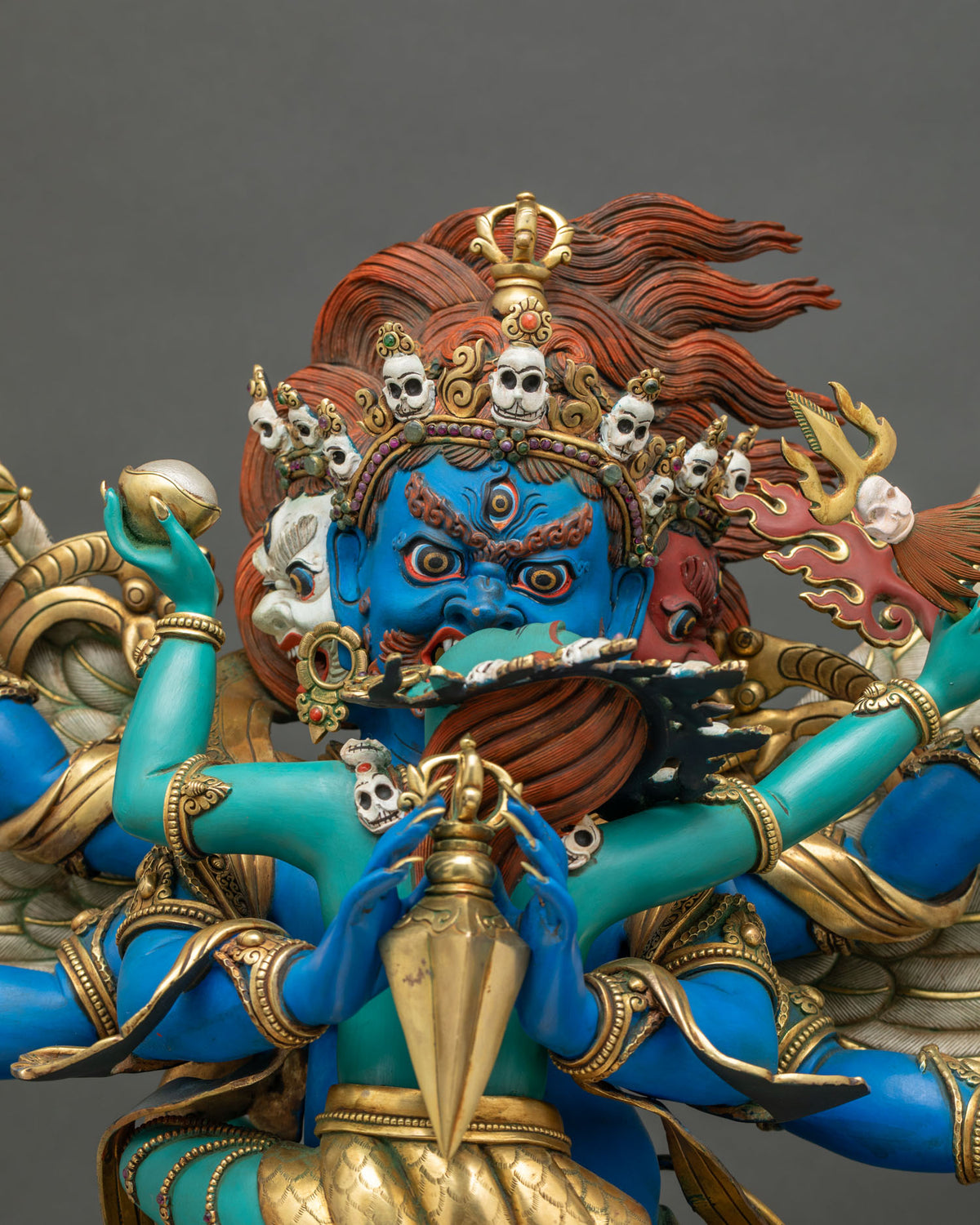 Vajrakilaya in union with turquoise consort Diptachakra, close-up with phurba and flaming hair