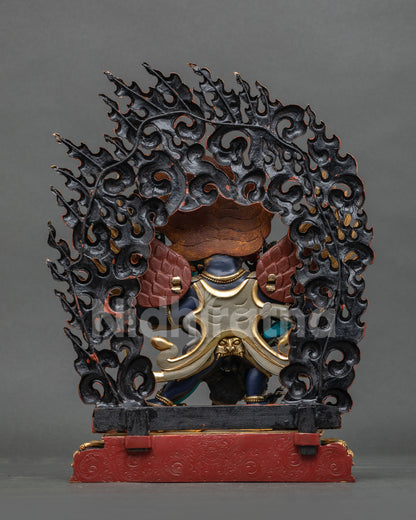 Vajrakilaya Statue back view intricate wings blazing halo copper Newari art.
