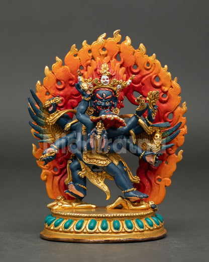 Vajrakilaya Statue from Nepal with gold gilded copper body, acrylic details, and lotus throne.