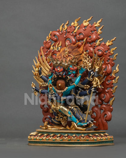 Vajrakilaya Statue left side view central phurba carved wings blazing halo.