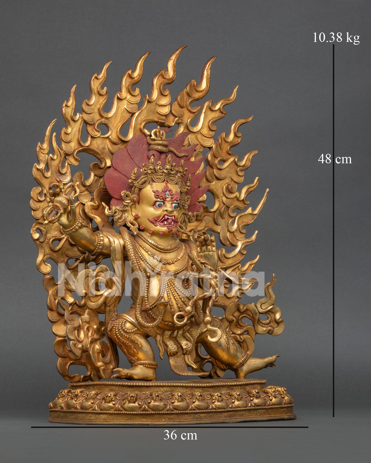 Vajrapani Buddhist sculpture with gold painted face holding vajra and lasso in powerful protector stance