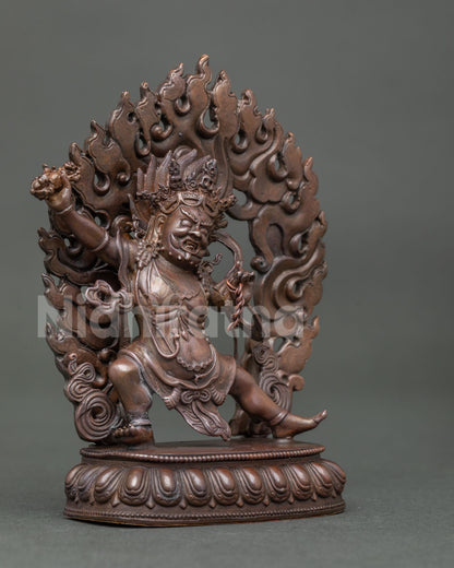 Vajrapani Buddhist Statue holding vajra and lasso surrounded by a flaming halo