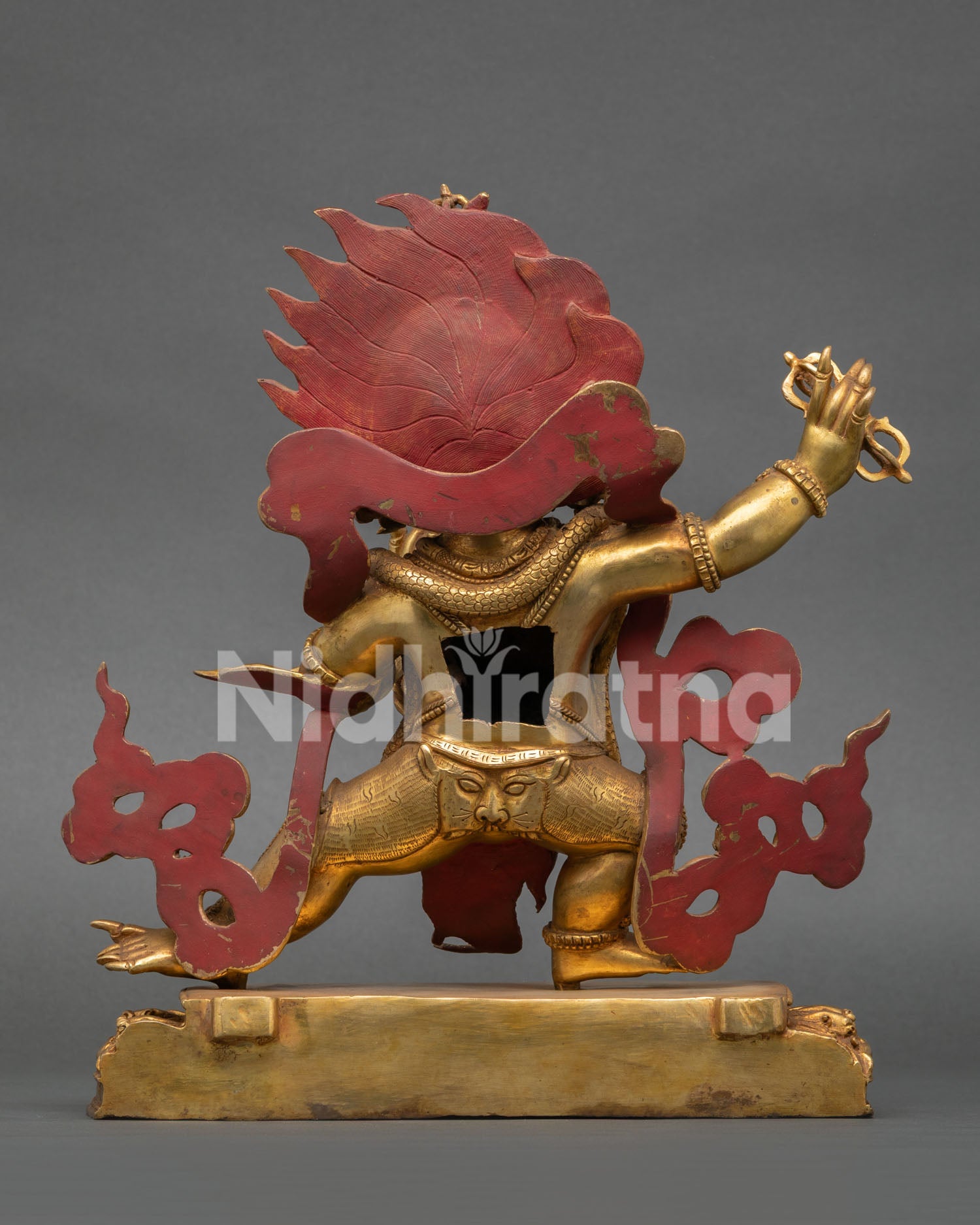 Vajrapani deity statue, standing on lotus seat with sacred Buddhist symbolism and Newari artistry
