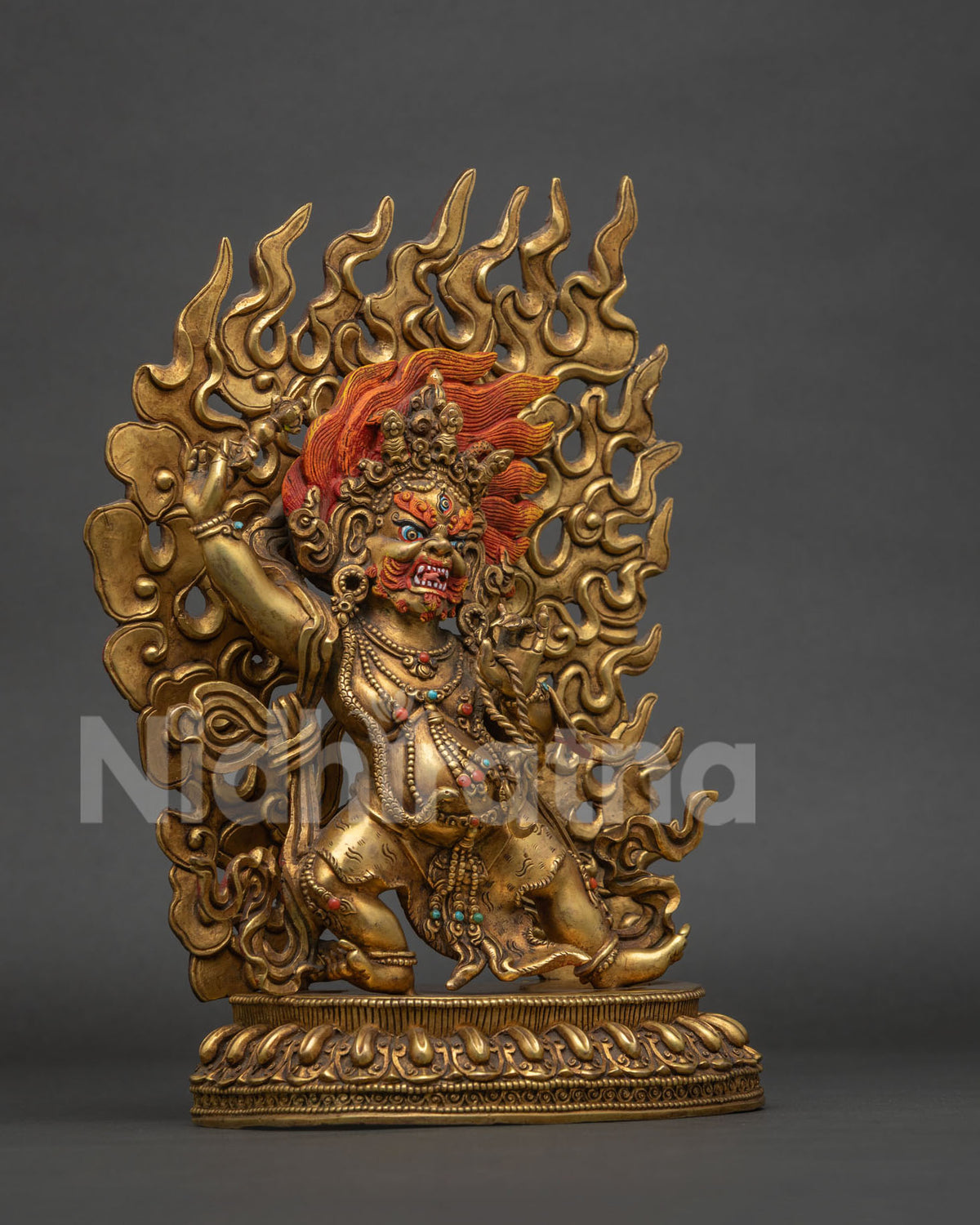 Vajrapani holding vajra thunderbolt and lasso on a hand carved lotus pedestal.