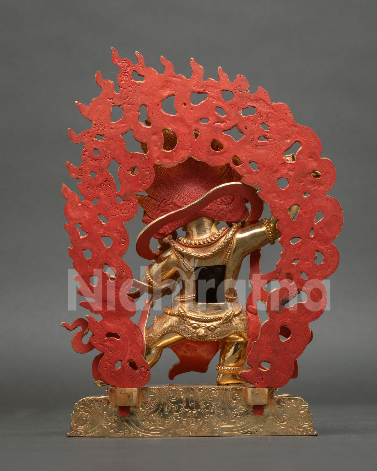 Vajrapani Statue back view blazing halo ornate crown gold fire gilded copper.