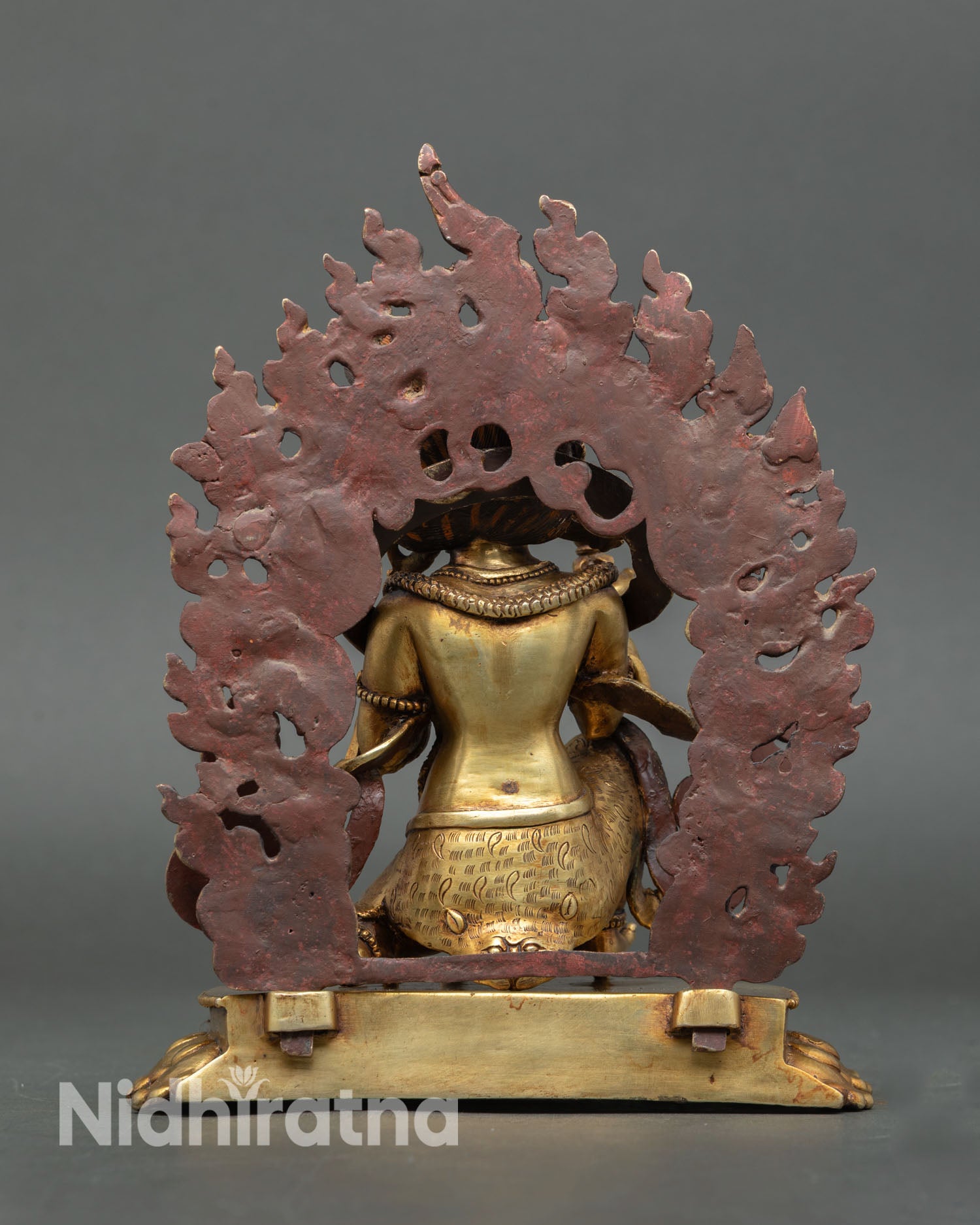 Vajrapani statue back view detailed robe carving flaming halo base copper gold gilded sculpture