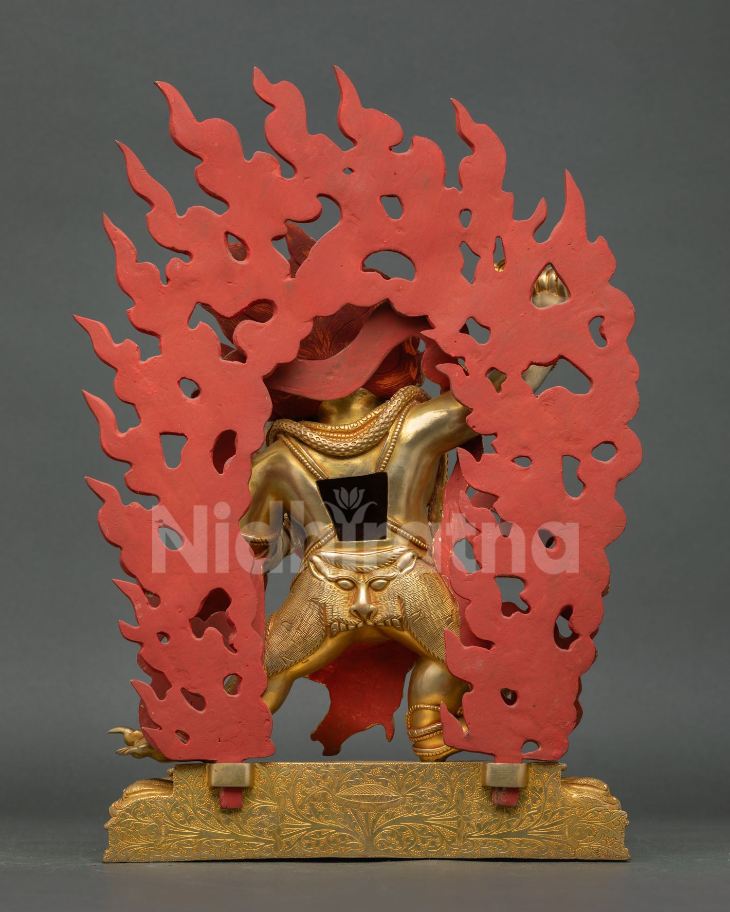 vajrapani statue back view, hand carved copper detailing with lotus pedestal and flowing motifs