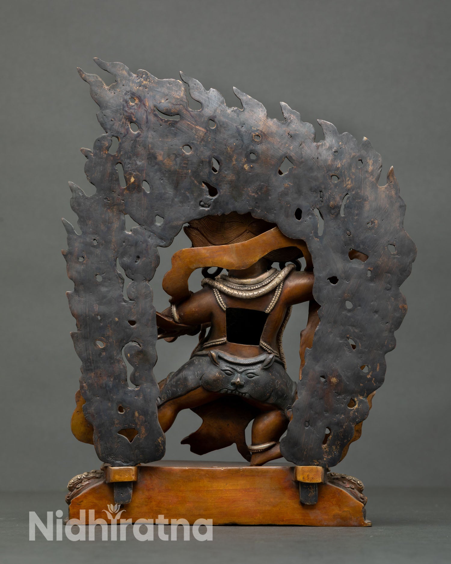 Vajrapani statue back view Himalayan craftsmanship silver plated detailing lotus base sacred Buddhist statue