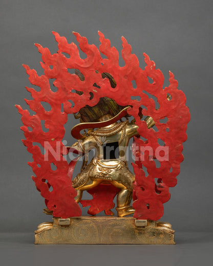 Vajrapani statue back view, red-painted flaming halo and tiger-skin garment, gold fire-gilded copper
