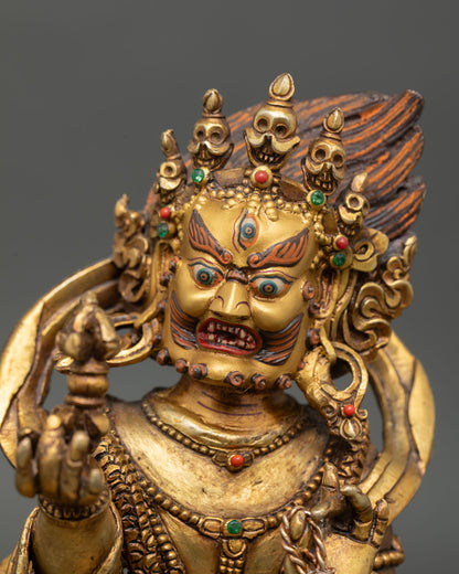 Vajrapani statue close up intricate copper craftsmanship gold gilded finish