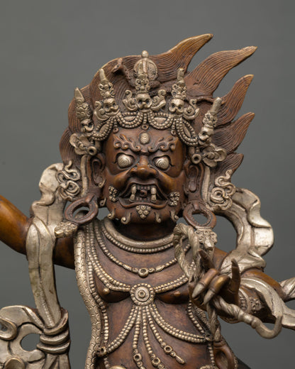 Vajrapani statue close up view wrathful expression copper silver flame halo Nepal handcrafted artwork